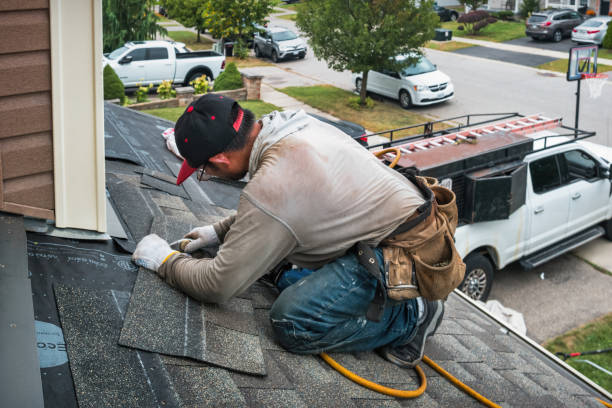 Professional Roofing technician working in Marion, ND